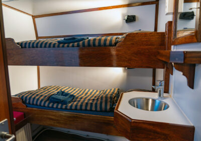 Noorderlicht onboard interior view of twin bunk cabin