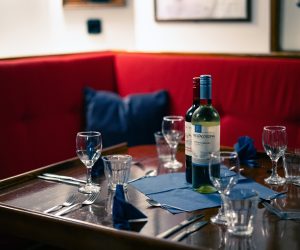 Noorderlicht onboard saloon set up for dinner